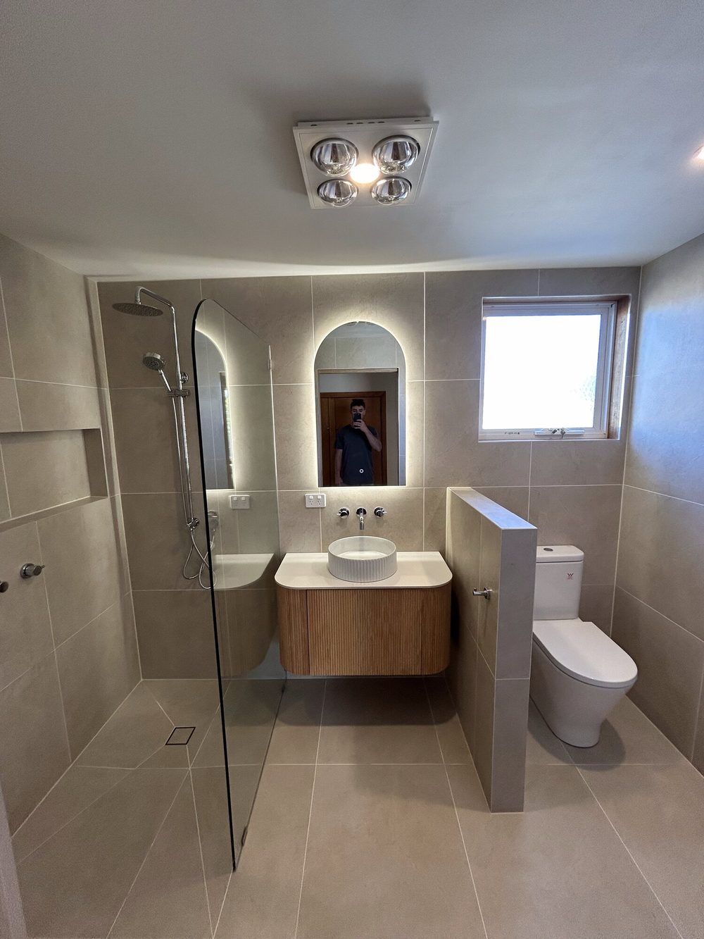 Modern bathroom renovation with walk-in shower