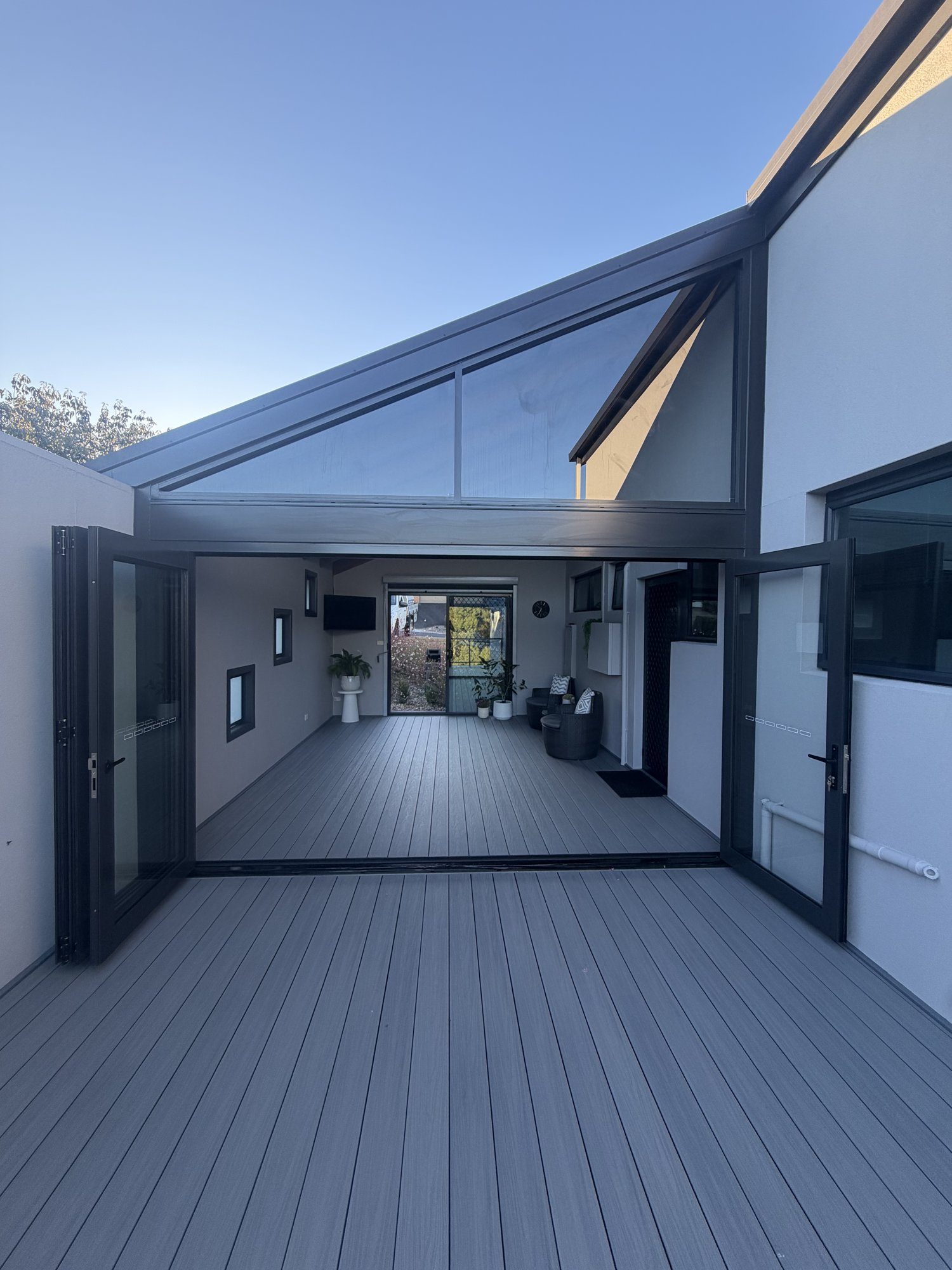 Custom deck and home extension built by CJB Build